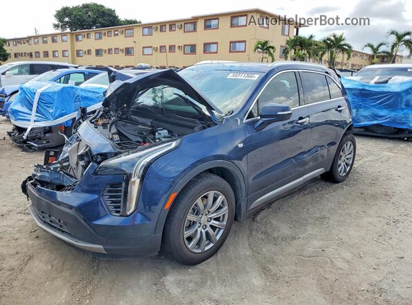 1GYFZCR43MF028086 2021 CADILLAC XT4 Blue Trasero izquierdo