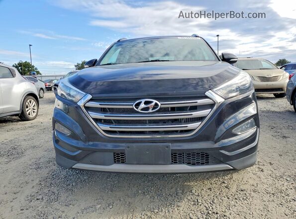 KM8J3CA20HU598586 2017 HYUNDAI TUCSON Black Widok z tyłu