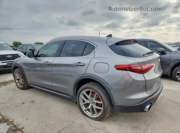 ZASFAKBN0J7B97991 2018 ALFA ROMEO STELVIO Gray Trasero derecho