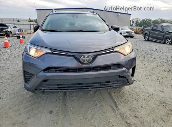 JTMZFREV2JJ197599 2018 TOYOTA RAV4 Gray Widok z tyłu
