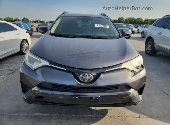 JTMZFREV9JJ740799 2018 TOYOTA RAV4 Gray Widok z tyłu