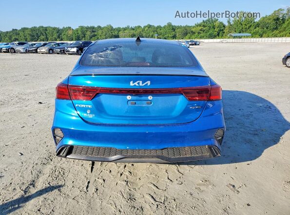 3KPF54AD5PE661576 2023 KIA FORTE Синий Вид салона спереди