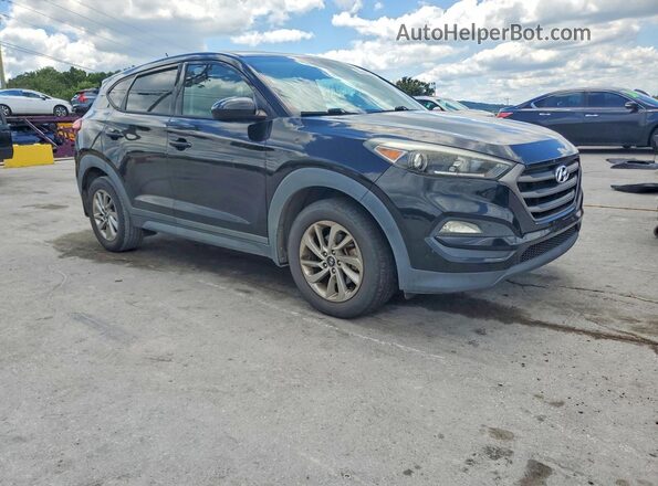 KM8J23A46GU127528 2016 HYUNDAI TUCSON Black Front view
