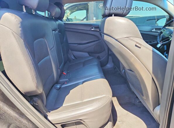 KM8J33A25GU068712 2016 HYUNDAI TUCSON Black Vista interior trasera