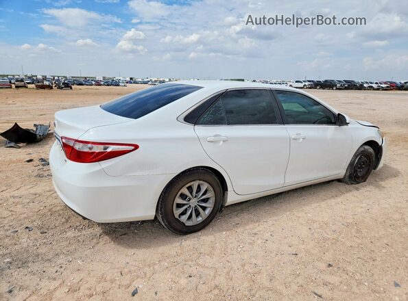 4T1BF1FK5GU239709 2016 TOYOTA CAMRY White Front right
