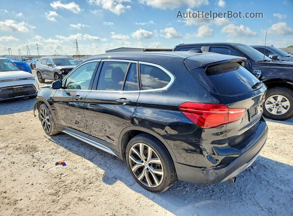 WBXHT3C34G5E55714 2016 BMW X1 Black Tył prawy