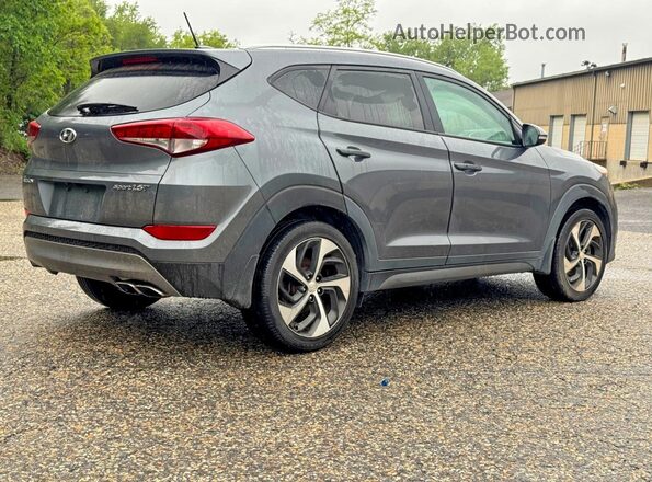 KM8J3CA2XGU194869 2016 HYUNDAI TUCSON Charcoal Front view