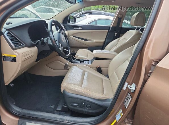 KM8J3CA22GU041905 2016 HYUNDAI TUCSON Brown Dashboard view