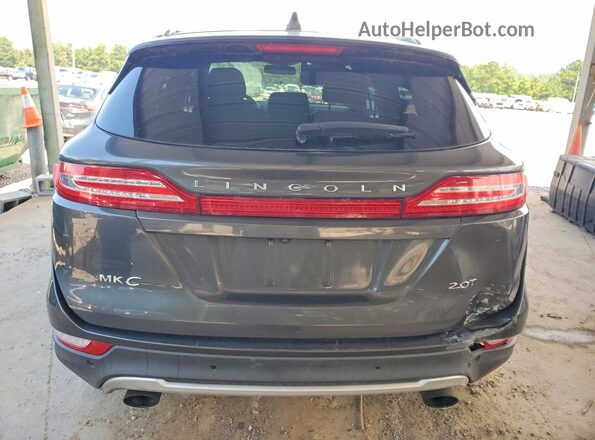 5LMCJ2C9XHUL21623 2017 LINCOLN MKC Charcoal Vista interior delantera