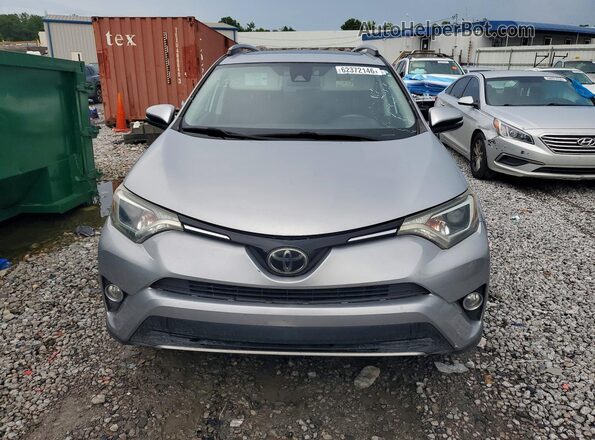 2T3WFREV6JW501876 2018 TOYOTA RAV4 Silver Widok z tyłu
