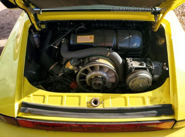 9117211399 1977 PORSCHE 911 Yellow Vista interior trasera