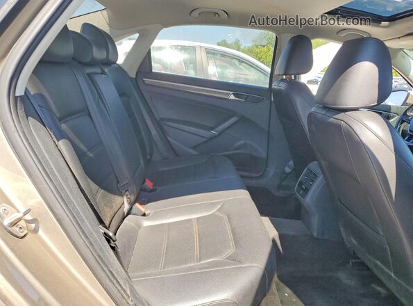 1VWBT7A36GC014458 2016 VOLKSWAGEN PASSAT Gold Widok wnętrza z tyłu