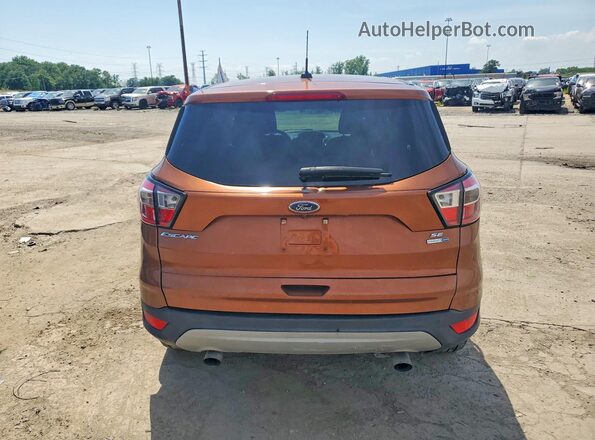 1FMCU9GDXHUC03007 2017 FORD ESCAPE Оранжевый Вид салона спереди