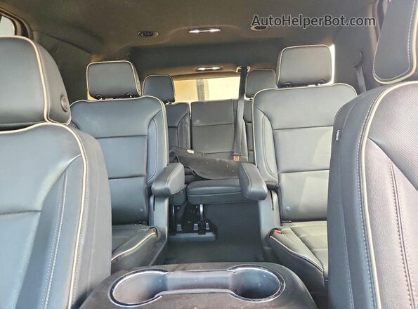 1GNSKSKD9PR338668 2023 CHEVROLET TAHOE White Սալոնի հետևի տեսք
