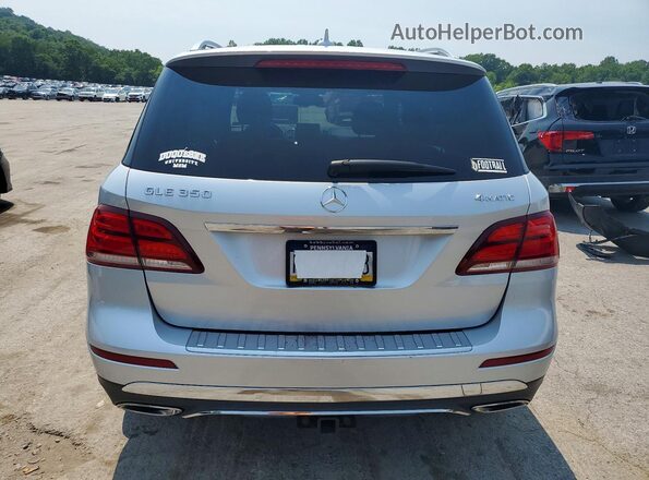 4JGDA5HB2GA802275 2016 MERCEDES-BENZ GLE Silver Front interior view