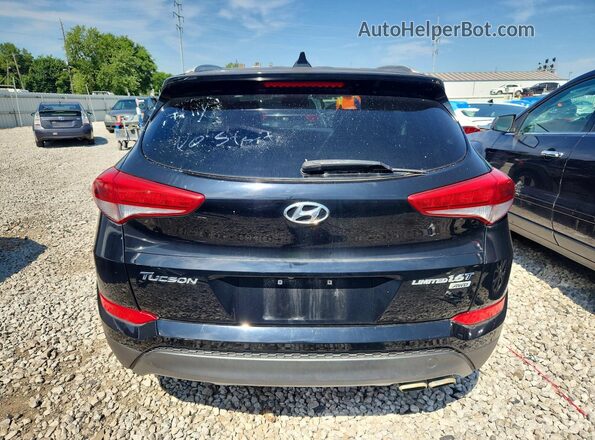 KM8J3CA24GU145960 2016 HYUNDAI TUCSON Black წინა სალონის ხედი