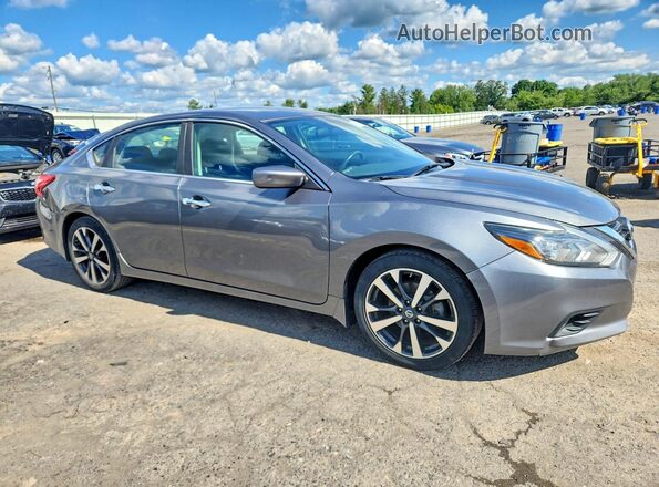 1N4AL3AP5GC278593 2016 NISSAN ALTIMA Silver Դիմացի տեսք