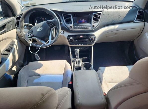 KM8J3CA20GU170581 2016 HYUNDAI TUCSON Silver ხელსაწყოთა პანელის ხედი