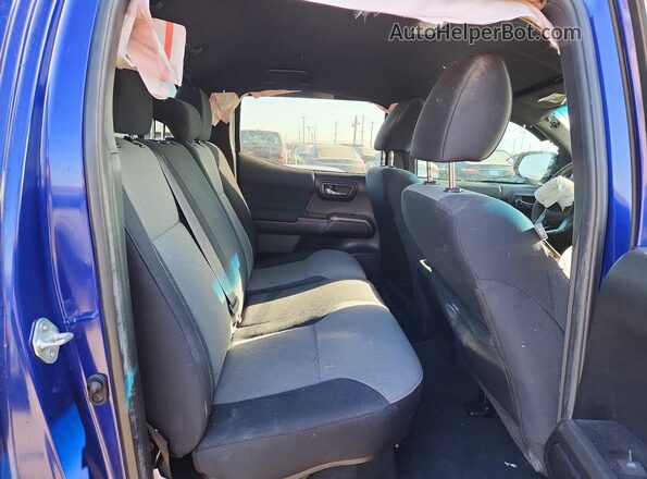 3TMAZ5CN2PM200187 2023 TOYOTA TACOMA Blue Vista interior trasera