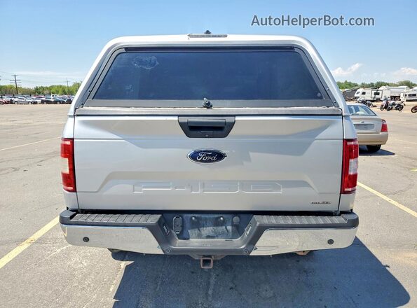 1FTFW1E50JKF63543 2018 FORD F150 Silver Widok wnętrza z przodu