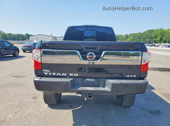 1N6BA1F43GN504073 2016 NISSAN TITAN Черный Вид салона спереди