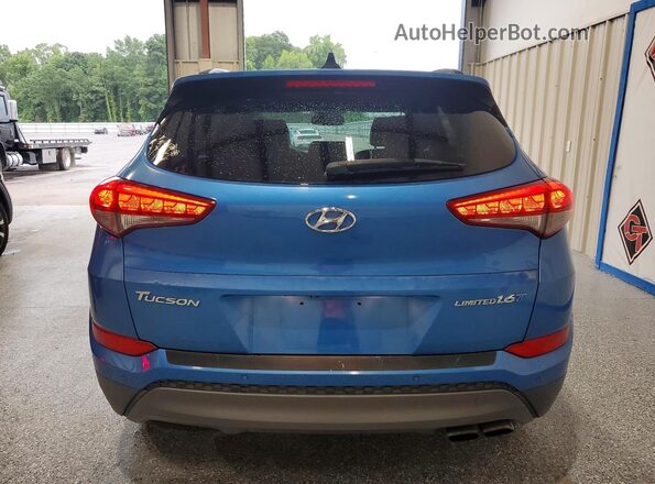 KM8J33A2XGU182429 2016 HYUNDAI TUCSON Blue Вид салону спереду