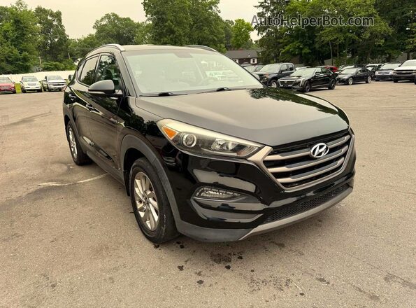 KM8J3CA29GU145985 2016 HYUNDAI TUCSON Black Դիմացի տեսք