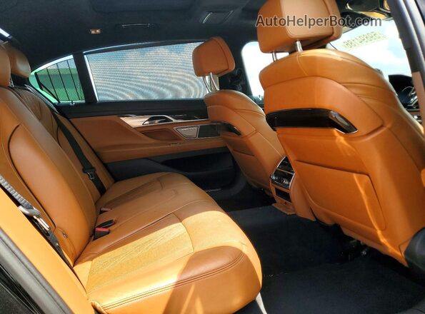 WBA7E2C50GGD99982 2016 BMW 7 SERIES Black Widok wnętrza z tyłu