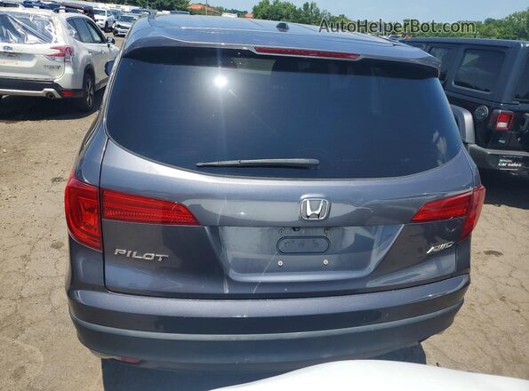 5FNYF6H52GB054576 2016 HONDA PILOT Gray Вид салону спереду