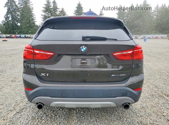 WBXHU7C33J3H43750 2018 BMW X1 Brown წინა სალონის ხედი