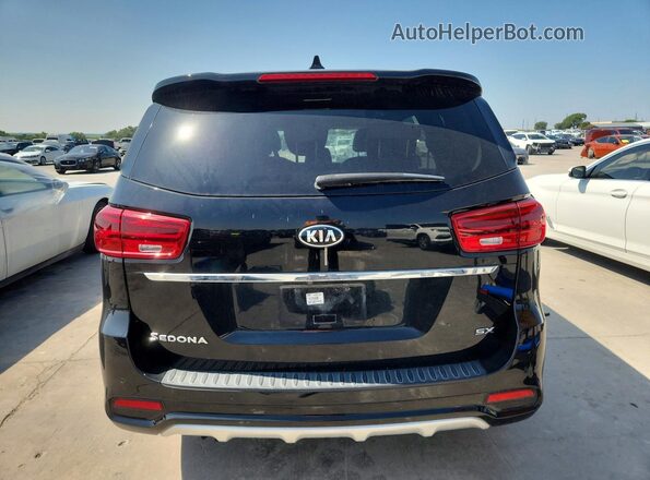 KNDMC5C16K6558445 2019 KIA SEDONA Black წინა სალონის ხედი