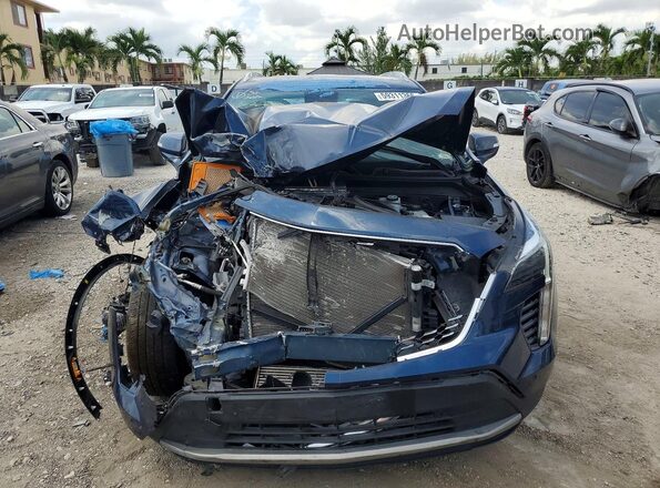 1GYFZCR43MF028086 2021 CADILLAC XT4 Blue Vista trasera