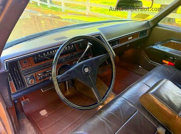 J0292047000000000 1970 CADILLAC DEVILLE Tan Vista de los asientos traseros