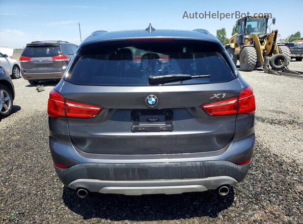 WBXHT3C31G5F64616 2016 BMW X1 Gray Սալոնի դիմացի տեսք