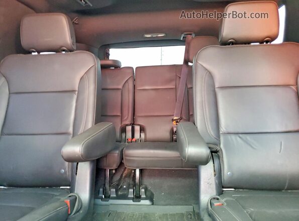 1GNSKPKD1NR140015 2022 CHEVROLET TAHOE Red Rear interior view