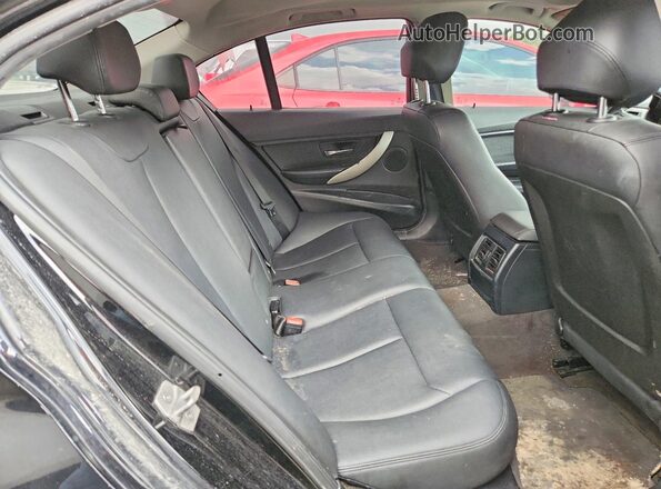 WBA8E1G58HNU13050 2017 BMW 3 SERIES Black Widok wnętrza z tyłu