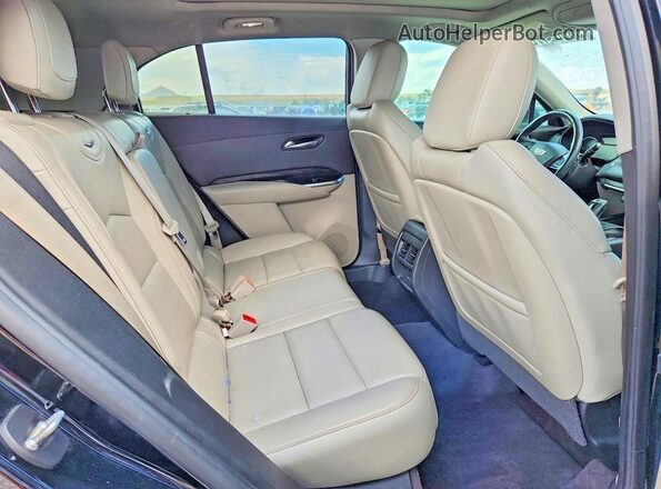 1GYFZCR40KF229683 2019 CADILLAC XT4 Черный Вид задней части салона