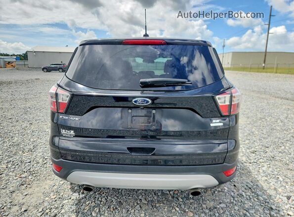 1FMCU0GD0HUD43689 2017 FORD ESCAPE Black Front interior view