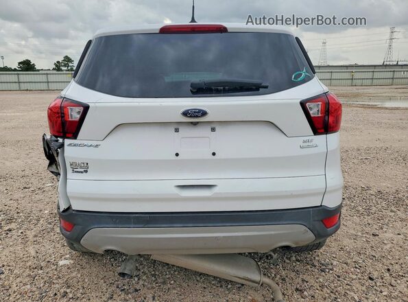 1FMCU0GDXKUA89335 2019 FORD ESCAPE White Вид салону спереду