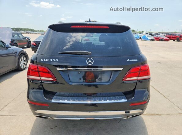 4JGDA5HB0GA727074 2016 MERCEDES-BENZ GLE Black Front interior view