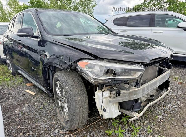 WBXHT3C34J5K22744 2018 BMW X1 Black Rear left