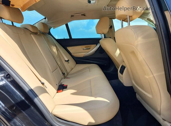 WBA8E1G3XHNU17695 2017 BMW 3 SERIES Black Rear interior view