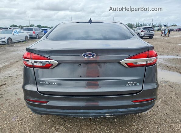 3FA6P0MU6KR137357 2019 FORD FUSION Угольный Вид салона спереди