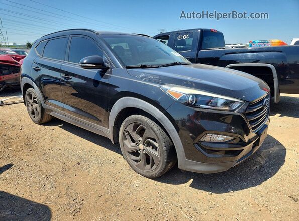 KM8J33A25GU068712 2016 HYUNDAI TUCSON Black Vista frontal
