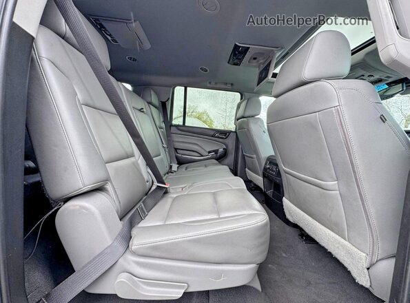 1GNSKHKC5KR222533 2019 CHEVROLET SUBURBAN Серый Вид салона спереди