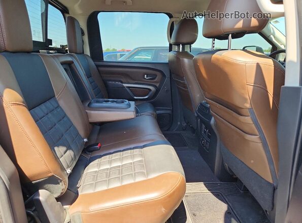 1N6BA1F45GN508223 2016 NISSAN TITAN Black Vista interior trasera