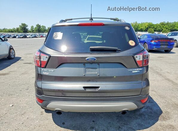 1FMCU9J94HUD90684 2017 FORD ESCAPE Black Вид салону спереду