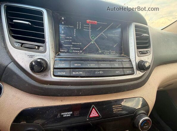 KM8J33A23GU220468 2016 HYUNDAI TUCSON Red Vista del compartimento del motor