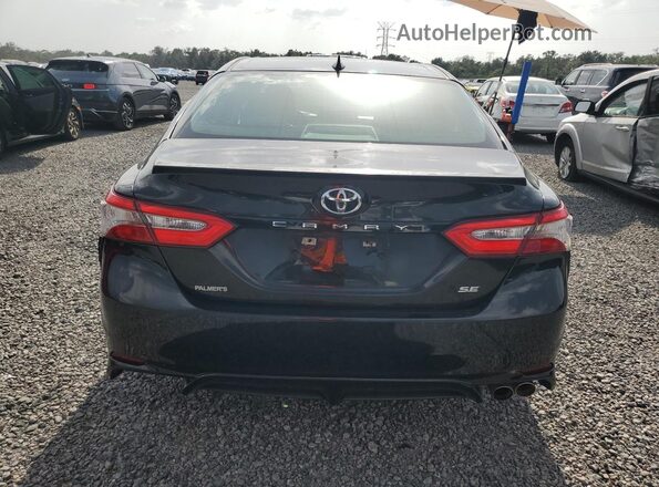 4T1B11HK2KU714978 2019 TOYOTA CAMRY Черный Вид салона спереди