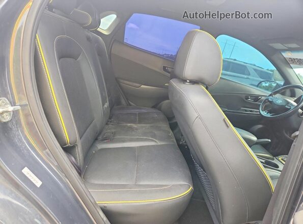 KM8K33A59KU269939 2019 HYUNDAI KONA Charcoal Vista interior trasera